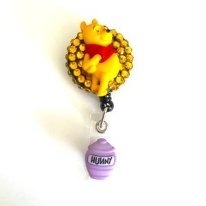 Pooh badge reel